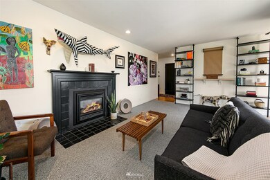 Living room has a gas burning fireplace; cozy! 