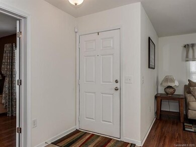 As you enter your new home, the living room and dining area are on the left, with the office on the right.