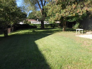 Deep, fenced-in backyard.