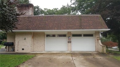 Two Car Garage with Cement Driveway