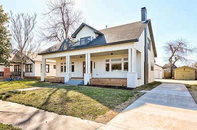 View of front of house with an outdoor structure, 