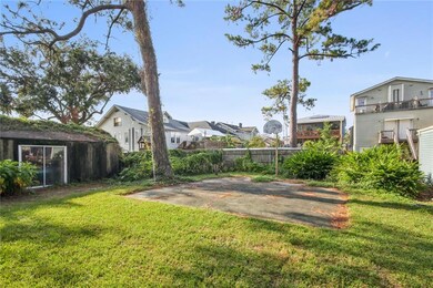 Rare large Uptown backyard (appears to be fenced).