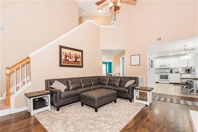 View from the great room of the staircase leading up to the master suite and two other large bedrooms!