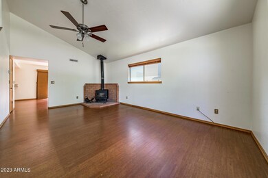 Living Room with Wood Burning Fireplace
