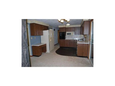 Kitchen. kitchen has new vinyl and covers entire k