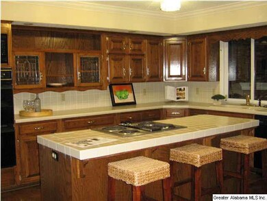 Large kitchen with an eating area and ample island