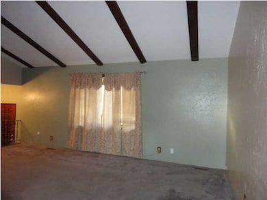 Vaulted ceilings in the living room and dining roo