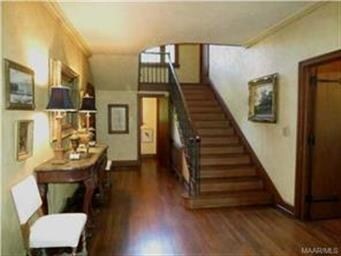 View of stairwell with iron handrails-notice the o
