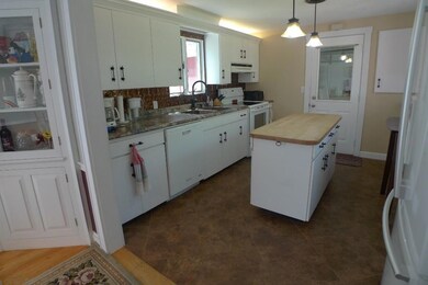 Kitchen with center island and...