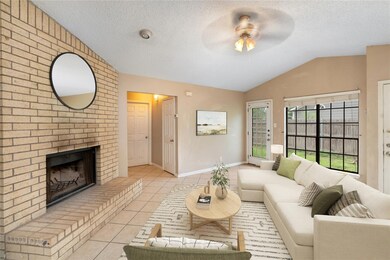 Living area with vaulted ceiling, a ceiling fan, 