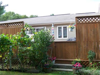 Exterior Back. Large private rear deck.