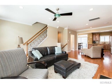 Family room with hardwood floors, neutral interior