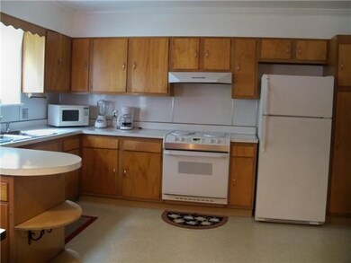 Kitchen Electric stove , dishwasher, and refrigera