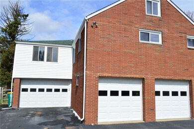 Here you can see the 3.5 car garage space. Two wor