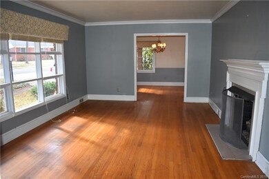 Spacious living room with gas fireplace, ceramic l