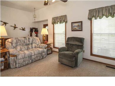 Living room view and foyer.