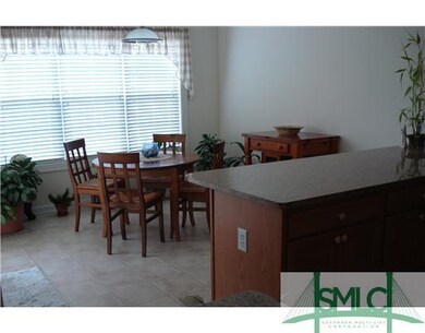 Other. Wonderful eat-in area with sliding door to 