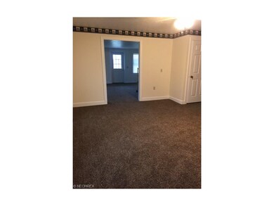 view from West Wall in dining room looking into th