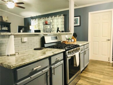 Remodeled kitchen with new Samsung 5 gas burner ov