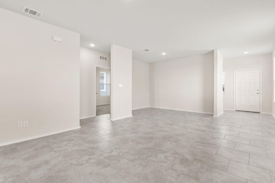 Ceramic tile flooring throughout the living area.