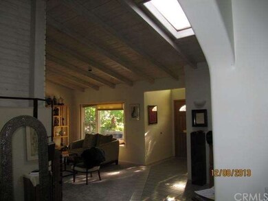 Looking South at  front room and entry