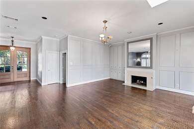 Unfurnished living room with dark wood-type floori