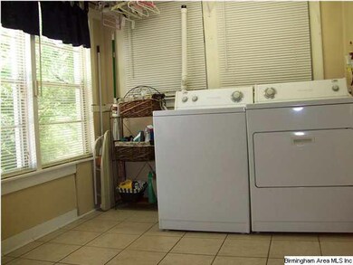 Main level home side door leads to the large laund