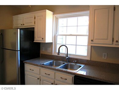 Kitchen - Large window in kitchen provides light a