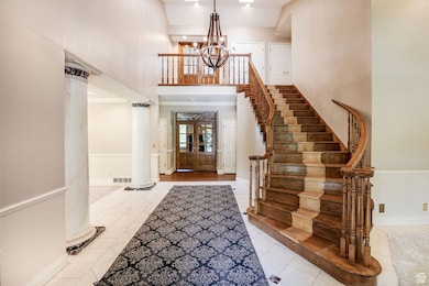 Marble flooring.  Runner on stairs removed.
