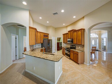 Granite counter, wood cabinets