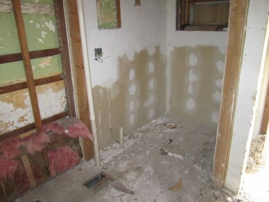 gutted bathroom in unit 3
