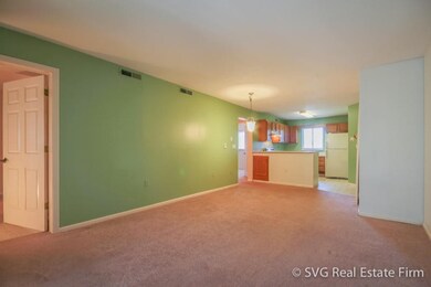 Open dining area is cheerful & bright