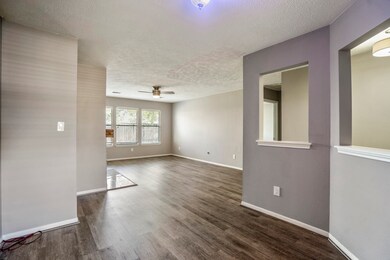 The dining room opens into the spacious living roo
