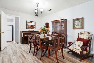 Raised floor dining area off to side from front do