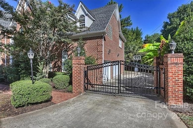 Dual gate and 3 car garage. Flat driveway to play 