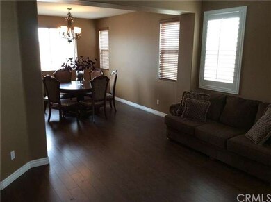 FORMAL LIVING AND DINING COMBO.
