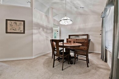 Located just off the living room, this dining room