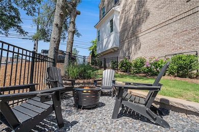 View of patio / terrace featuring an outdoor fire pit