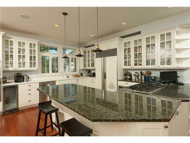 Kitchen. Enjoy the bar seating at...