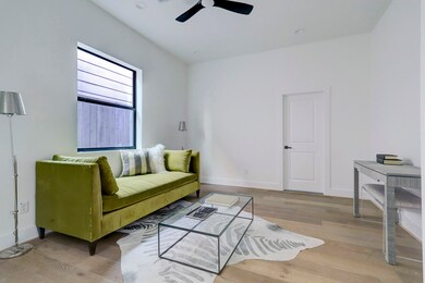 On the first floor, a bedroom with en-suite bath a