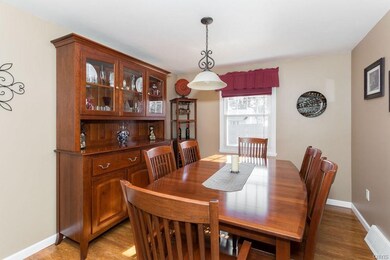 The dining room is roomy enough to fit a large table and hutch.