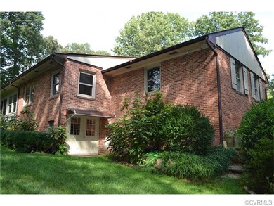 Side view with entrance to Basement