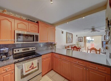 6950 W 6th Ave unit 416, Hialeah, FL 33014 - photo 2
