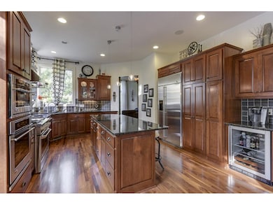 Walnut flooring, tons of cherry cabinets and high 
