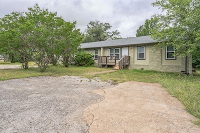 Ranch-style house with brick siding, crawl space,