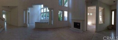Office to the right with double fireplace