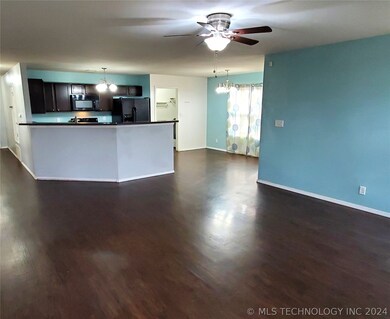 Living view towards wrap around bar.