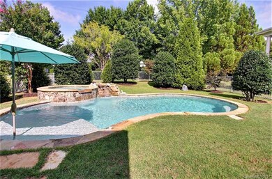 Backyard oasis complete with spa, pool w/a tanning
