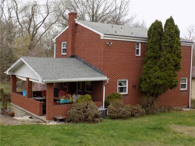 Fabulous side porch!  Enjoy your coffee in the mor