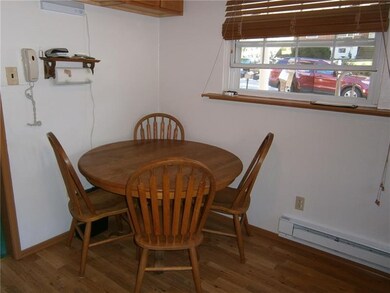 THE DINING AREA IN THE EAT-IN-KITCHEN